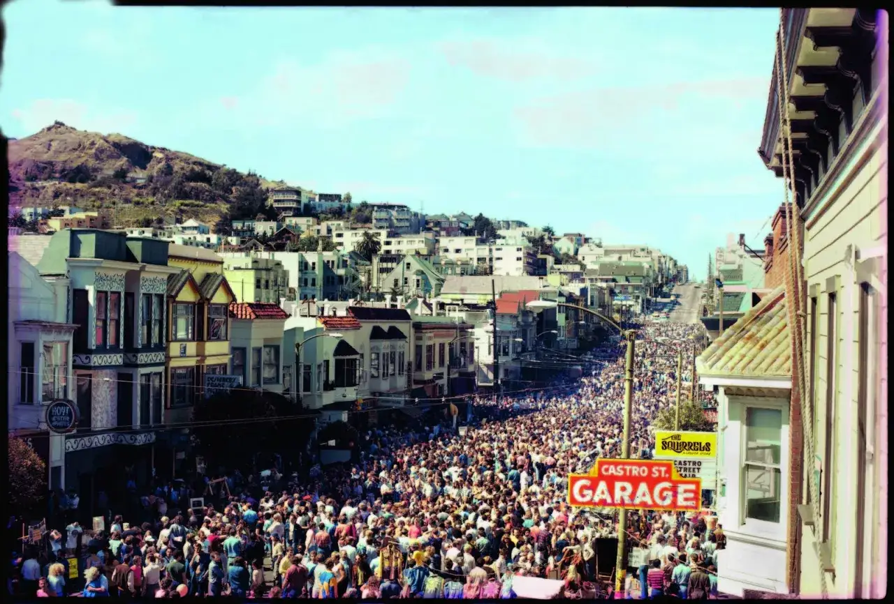 A massive crowd fills Castro Street, San Francisco, a vibrant scene in the gayest city in America.